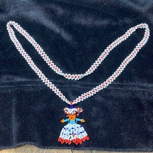 Colorful Beaded Necklace with Doll Pendant
